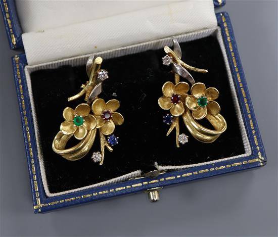 A pair of 18k, sapphire, ruby, emerald and diamond set foliate ear clips, 33mm.